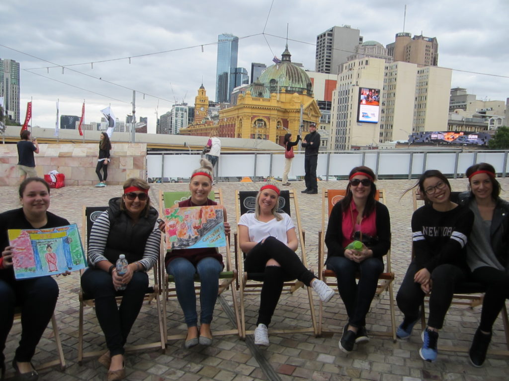 Art Challenge Federation. Square relaxing with staff in Melbourne